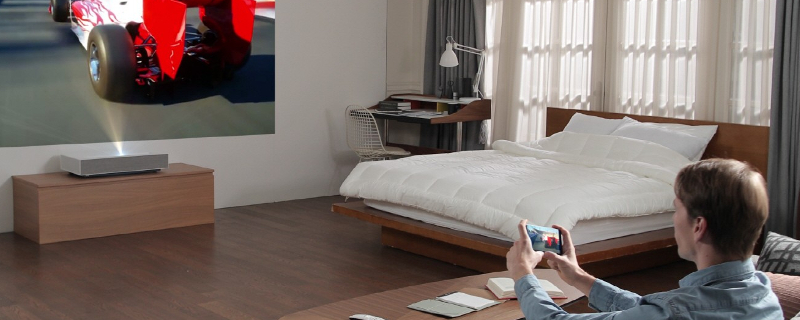 LG's HU85L 4K projector needs 2-inches of space to project a 90-inch screen